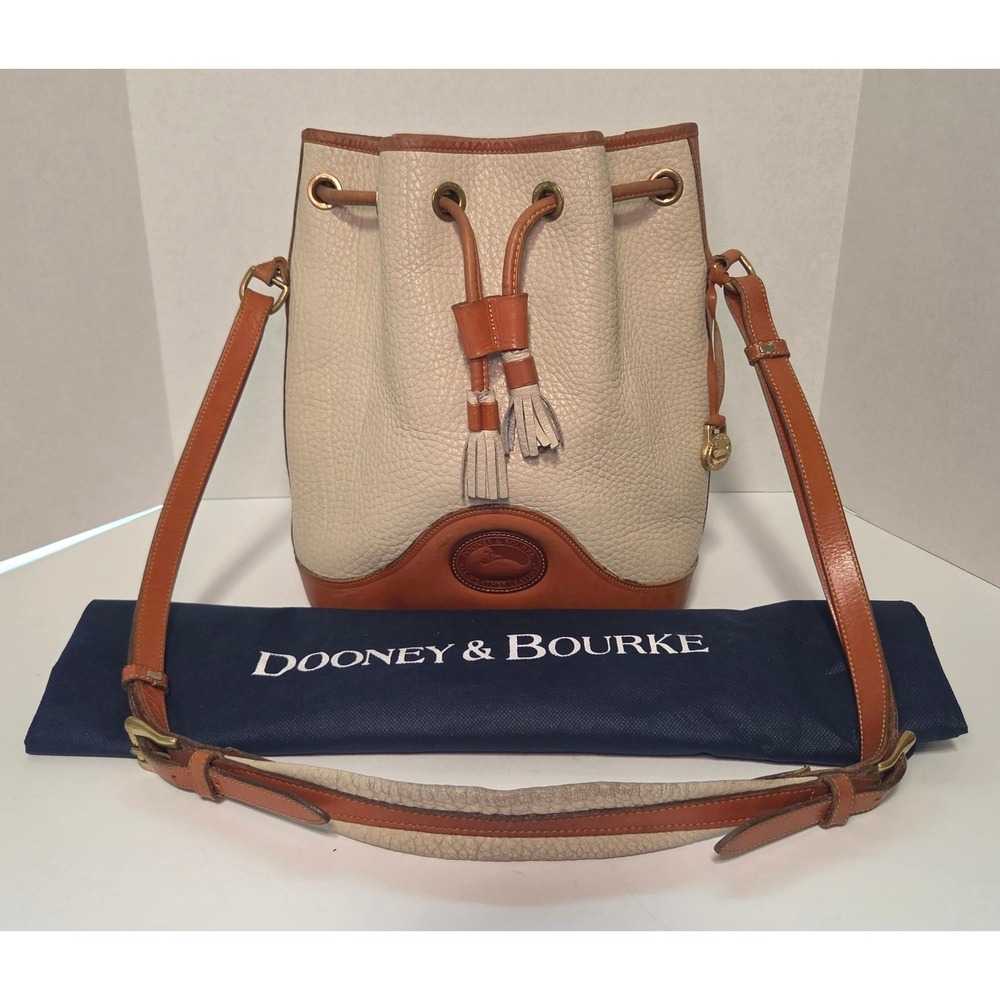 Dooney & Bourke Vintage All-Weather Leather AWL Drawstring Bucket Bag Cream Tan